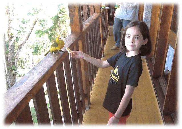 Maria Beatriz: Alimentando os pássaros