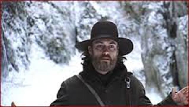 Ada is hunting and Inman walks up to her