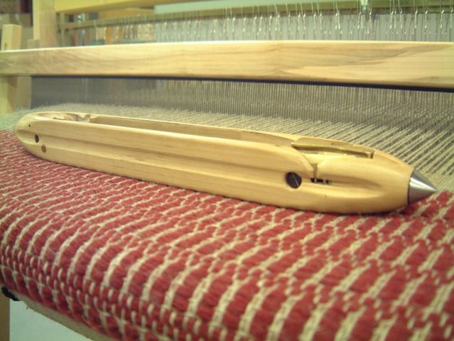 John Kay invents flying shuttle