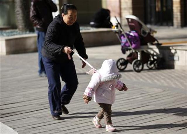 China says on path to eventually scrap one-child policy