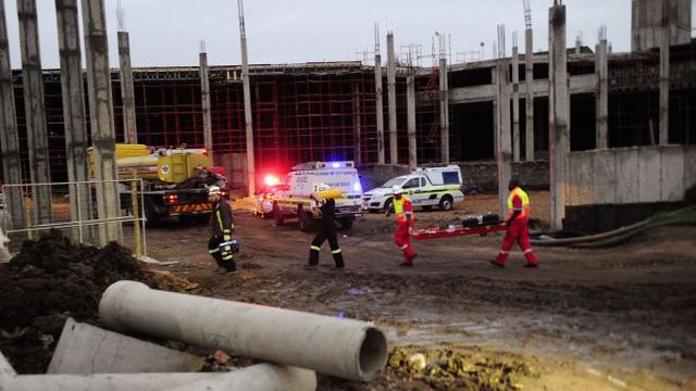 South Africa: rescue workers search debris after 1 killed in collapse of partly built mall