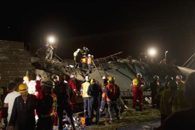 Search for survivors ends at collapsed South African building site