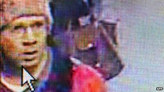 French police name arrested Paris gun suspect