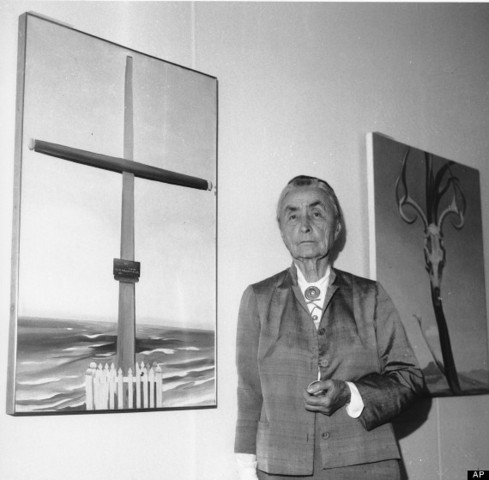 She helps organize and install her last exhibition