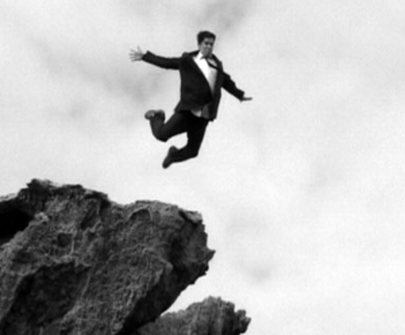 Milkman leaps a guitar