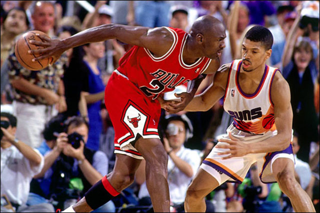 The Bulls win their third consecutive NBA title