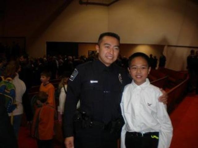 Uncle Loc police academy graduation