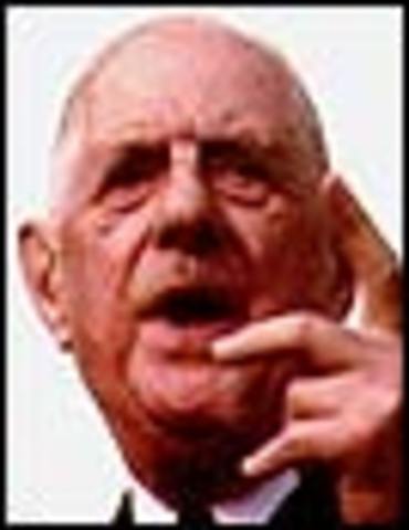 French President Charles de Gaulle vetoes British membership