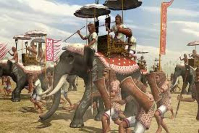 Chams loot Khmer capital Angkor.