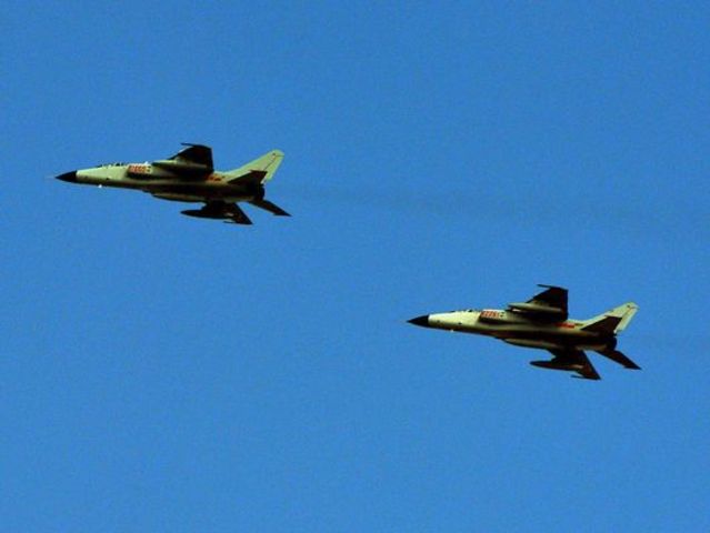 China warplanes tail U.S. and Japan fighter jets