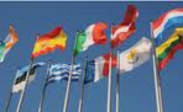 Portugal and Spain join the EC and the European flag is unveiled
