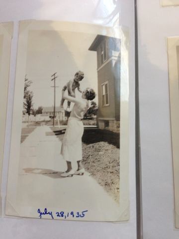 James being held by his Mother