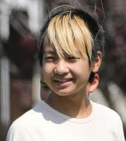 Brad's first child Maddox Chivan Jolie-Pitt but he was adopted born in Cambodia