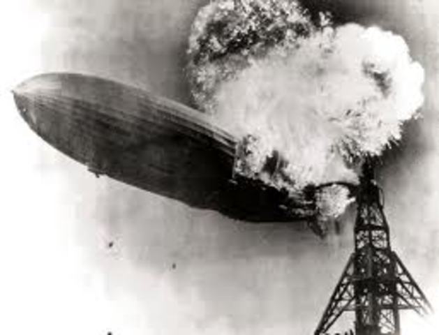 the hindenburg bursts into flames
