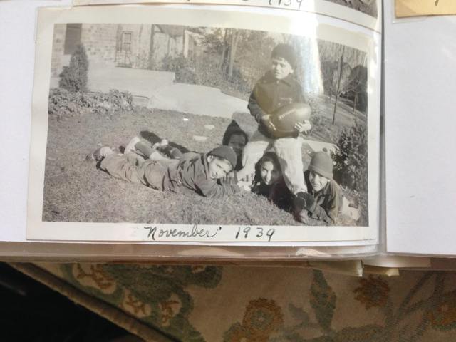 James playing football with family/friends
