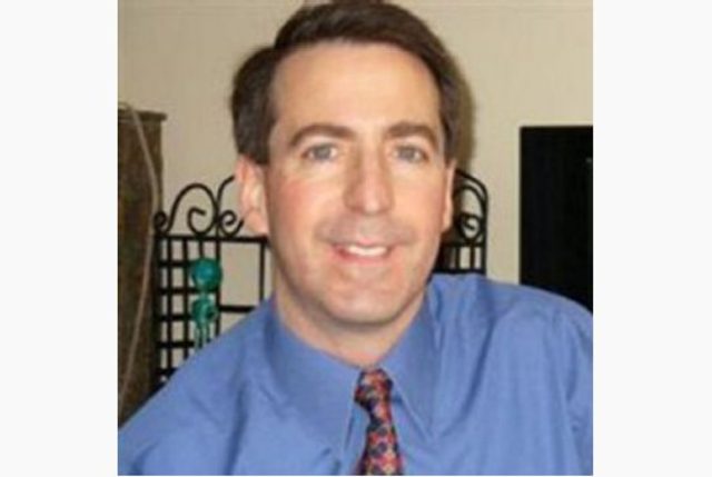 Gun man's body turned over