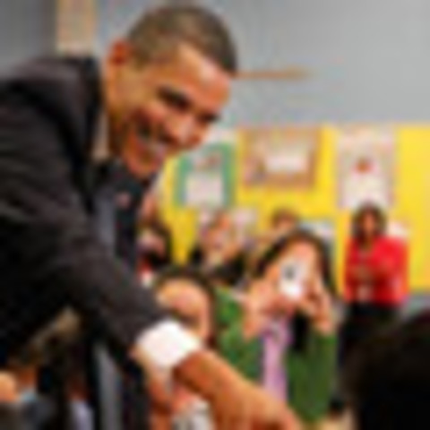 Barack Obama defeats John McCain