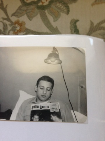 James readng a magazine in his dorm at the University of Wisconsin-Madison