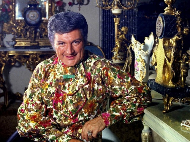 Liberace dies of AIDS