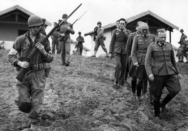 British and US forces defeat German and Italian armies in North Africa