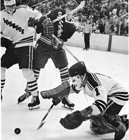 Doug Long smothers the puck for the save!