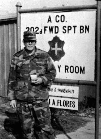 R&U repainting the Orderly Room sign