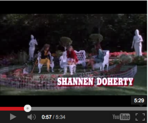 The Third Character which is introduced after the tile, at 0:57 seconds