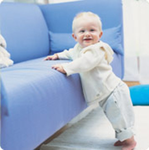 Walk holding on to furniture