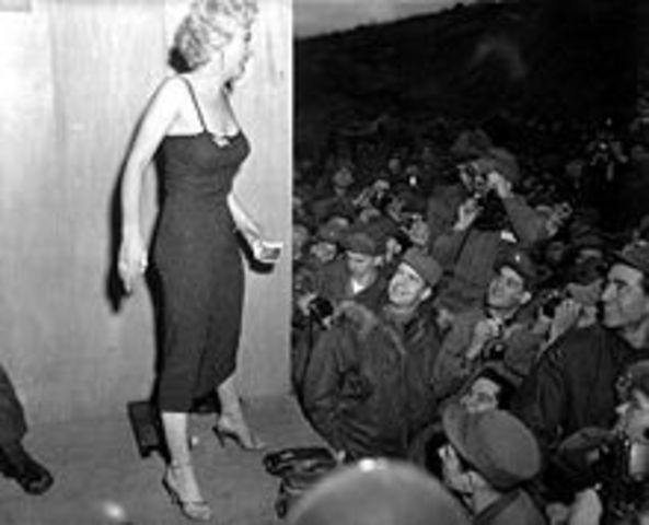 Monroe travels alone to Korea where she performed for 13,000 American Marines over a three-day period