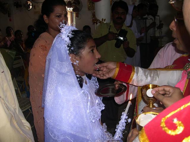 Maria Teresa Recieves Her First Communion