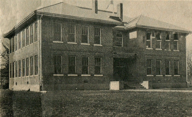 The third school was built as a two story brick building