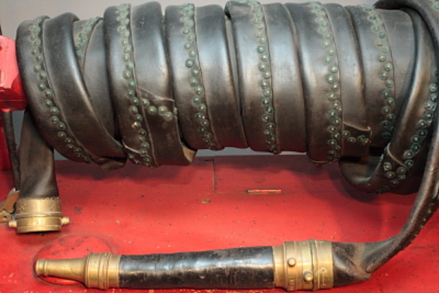Leather hose and couplings used to join lengths together.