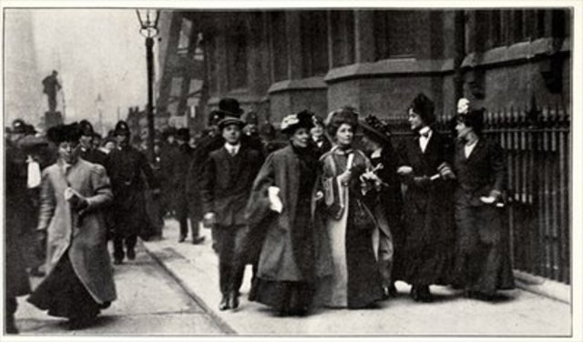 Mrs. Pankhurst carrying a petition from the Third Women's Parliament to the Prime Minister