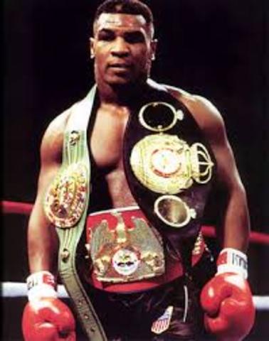 Mike tyson gets 2 titles