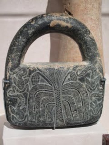 First set of weights invented