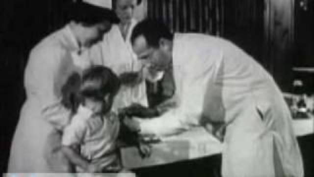 The first large scale vaccination of children against polio.