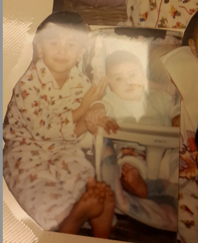 This is me grasping my brothers hand, using my fingers. So this could be the grasping reflex