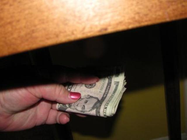 Asked to illegaly help a coworker for money