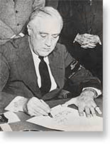 FDR signs executive order 9066