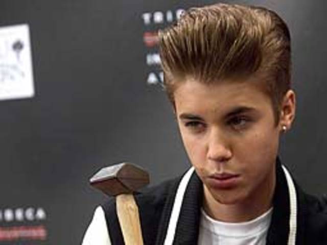 Bieber caught spitting from balcony