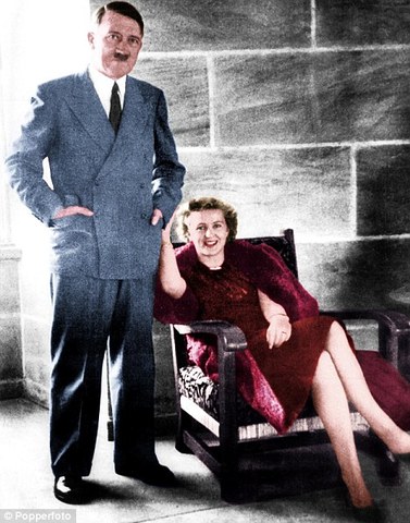 Adolf Hitler commits suicide- along with his wife