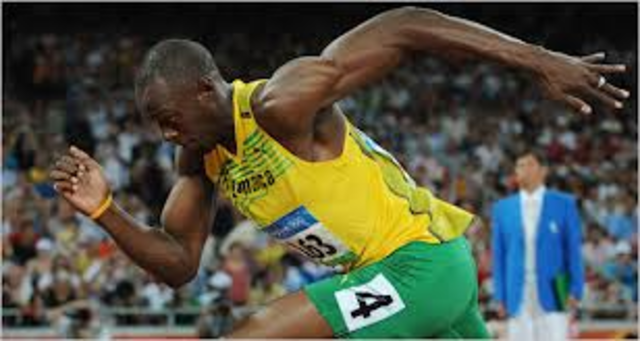 Usain Bolt breaks world record