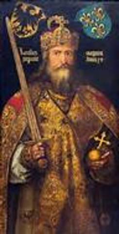 Charlemagne's rule ends.