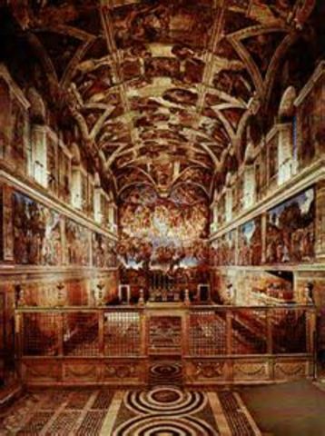 Michelangelo paints the ceiling of the Sistine Chapel