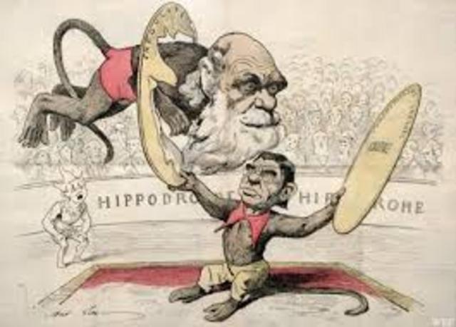 לס דארווין, בהמשך ל"מוצא המינים" בו פרסם את תורת האבולוציה מפרסם את "מוצא האדם" הרומז שגם האדם הוא בעל חיים - וזוכה להתעלמות, גינוי, נידוי ובוז מהכנסייה (כולל קריקטורות לעגניות והתקפות אישיות)