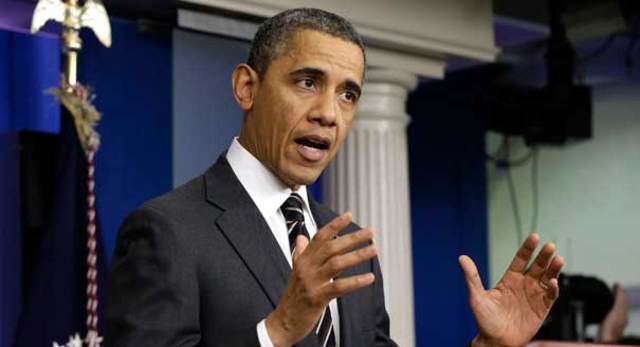 Obama signs ¨American recovery and reinvestment act¨