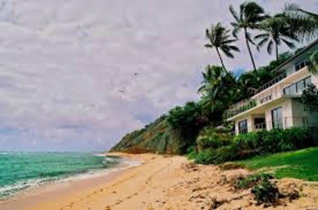 Buy a house next to the beach.