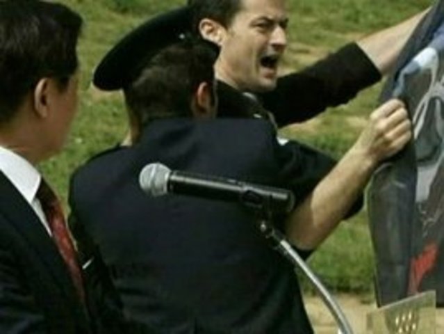 Protestors disrupt lighting of Olympic flame