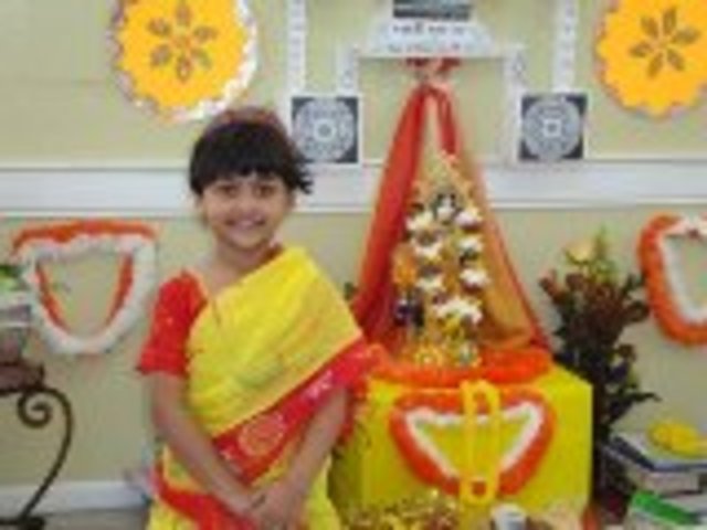 WEARING TRADITIONAL OUTFIT...