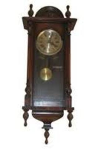 Invención del reloj con péndulo y la imprenta